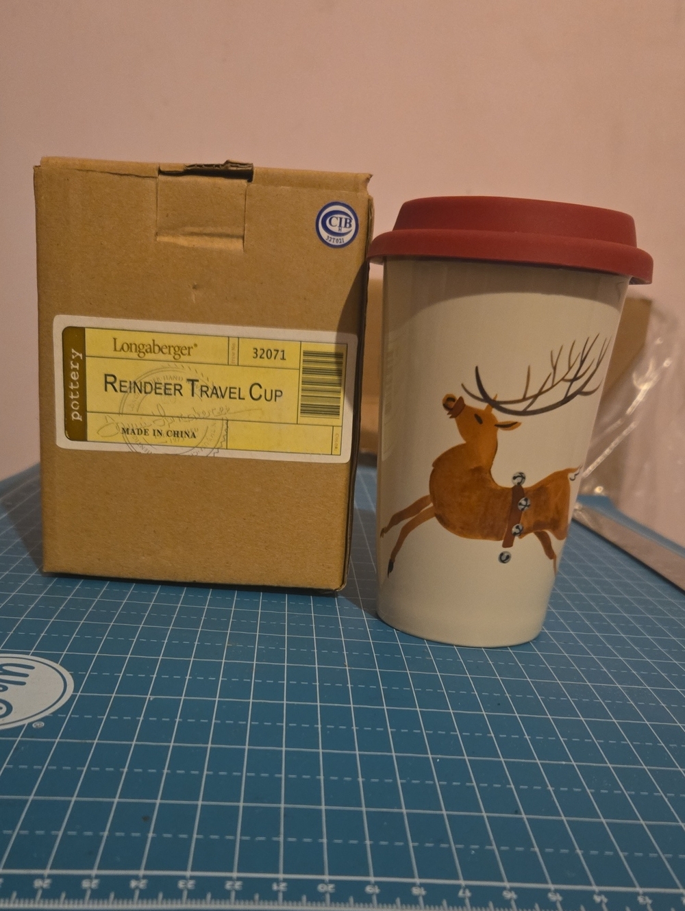Longaberger Cream Travel Cup with Red Lid and Reindeer Motif